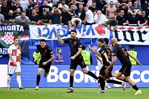 Albania's players celebrate their side's second goal